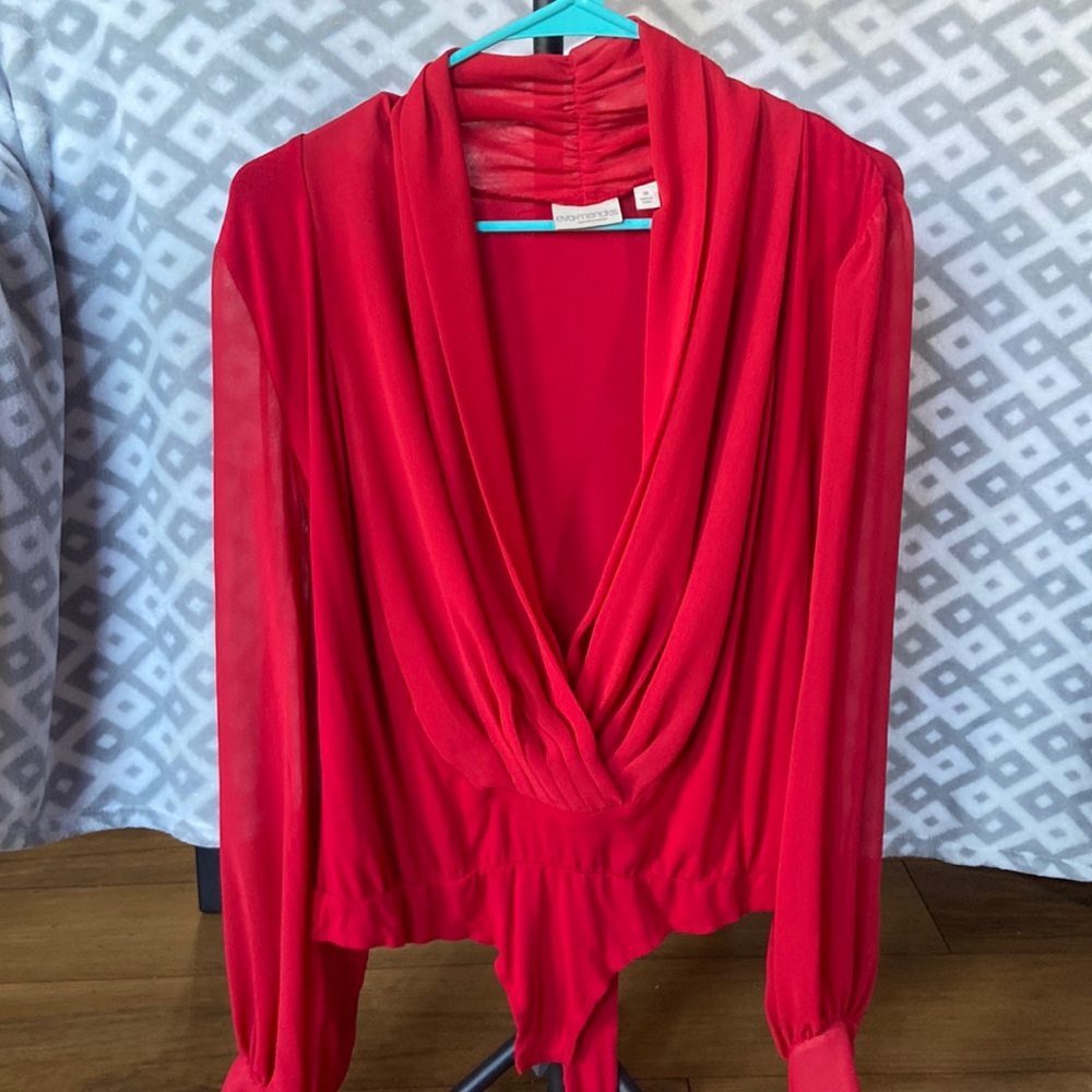 Crossover style, body suit blouse.
